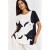 Blusa Ampla Malha Morcego Manga Curta Estampa Bichanos em Cena